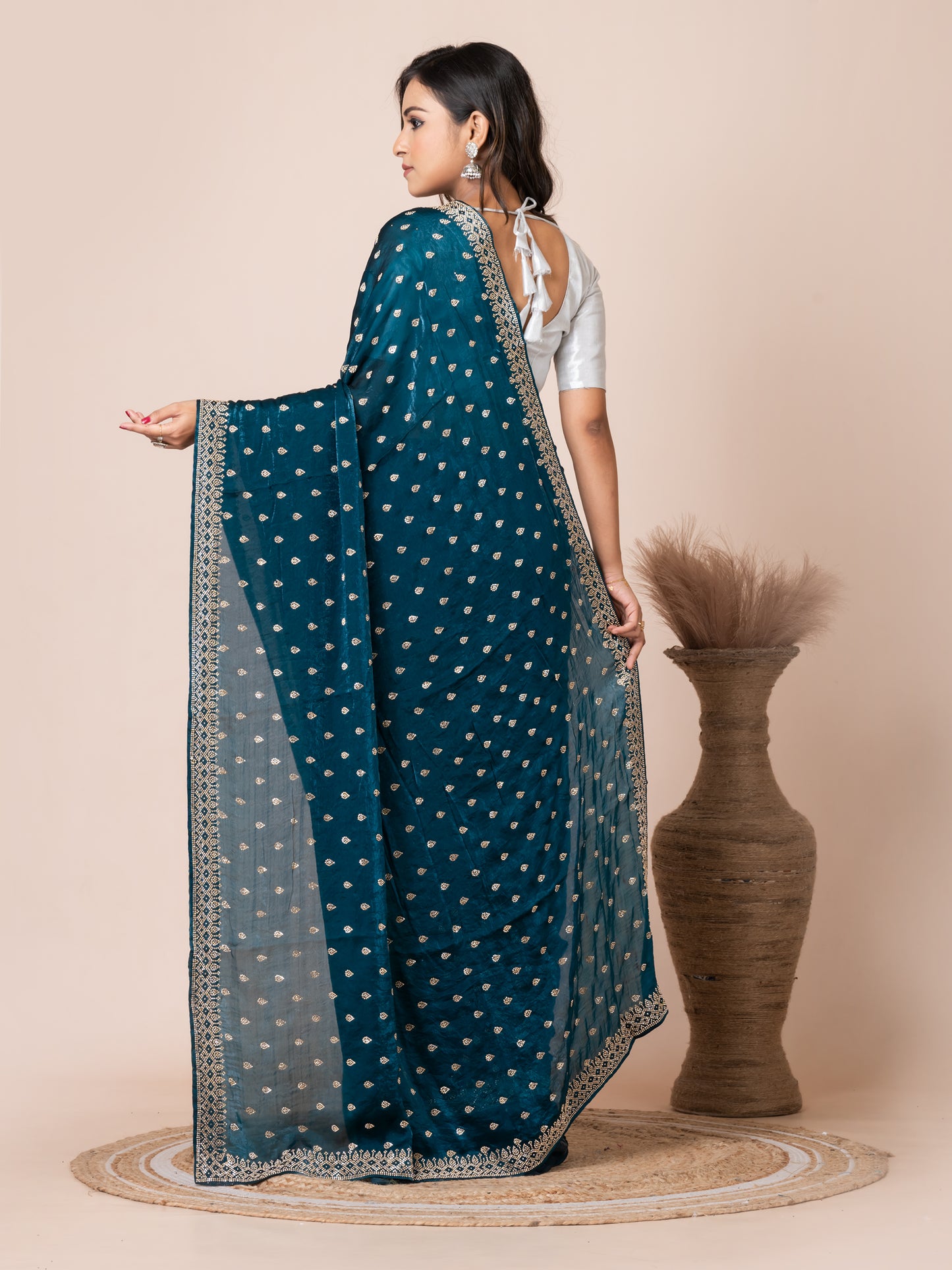 Sophisticated Teal Malmal Silk Saree with Embroidered Border