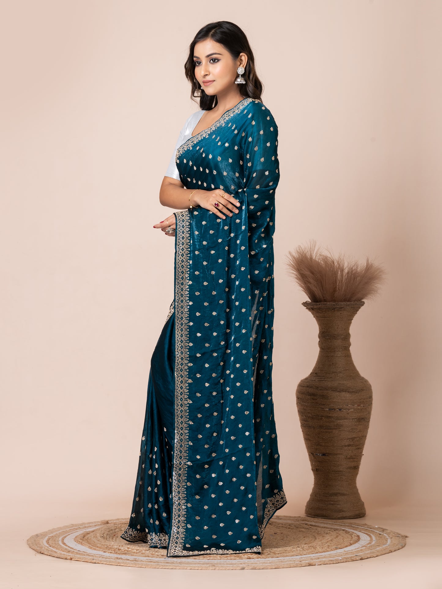 Sophisticated Teal Malmal Silk Saree with Embroidered Border