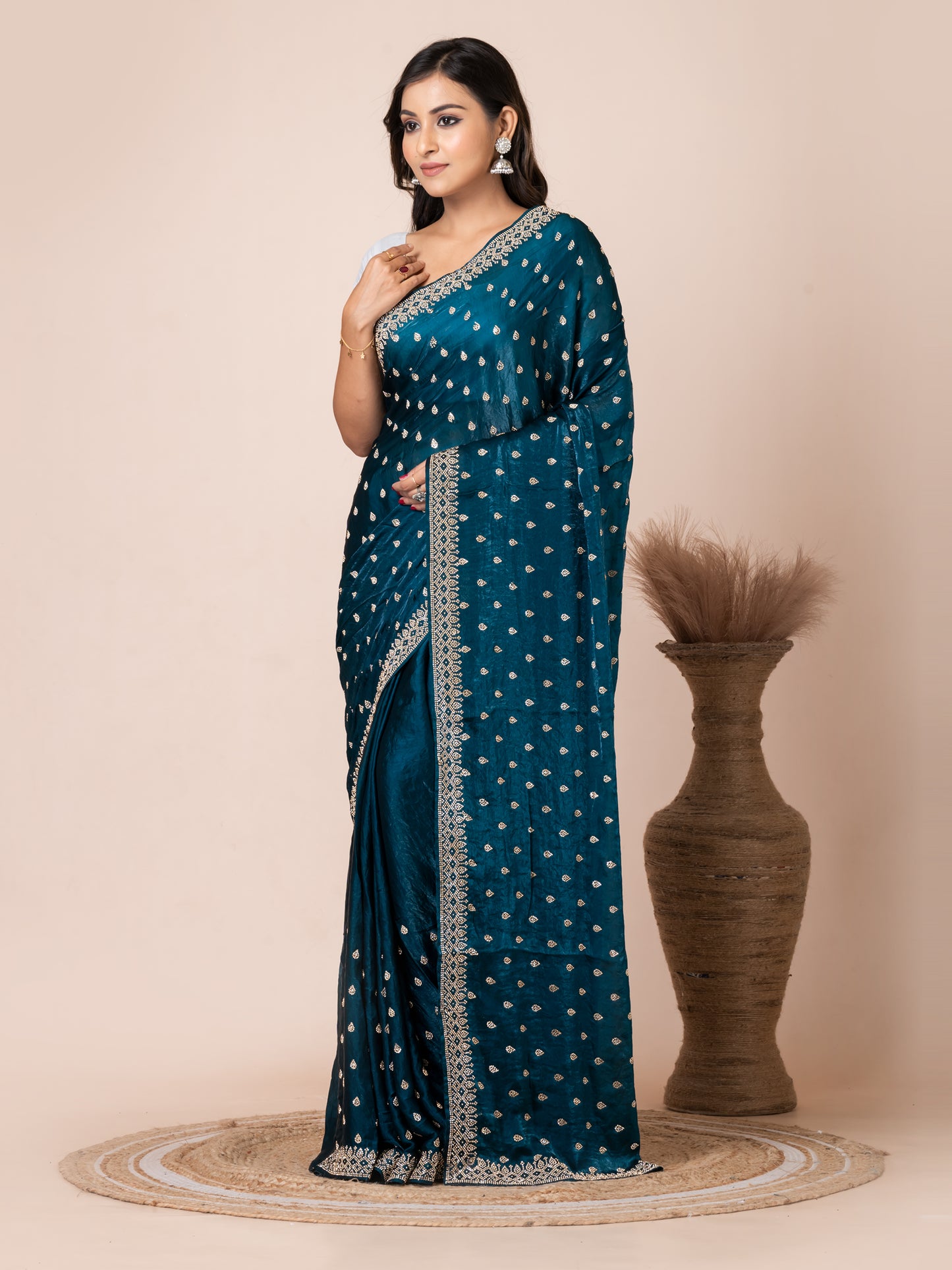 Sophisticated Teal Malmal Silk Saree with Embroidered Border