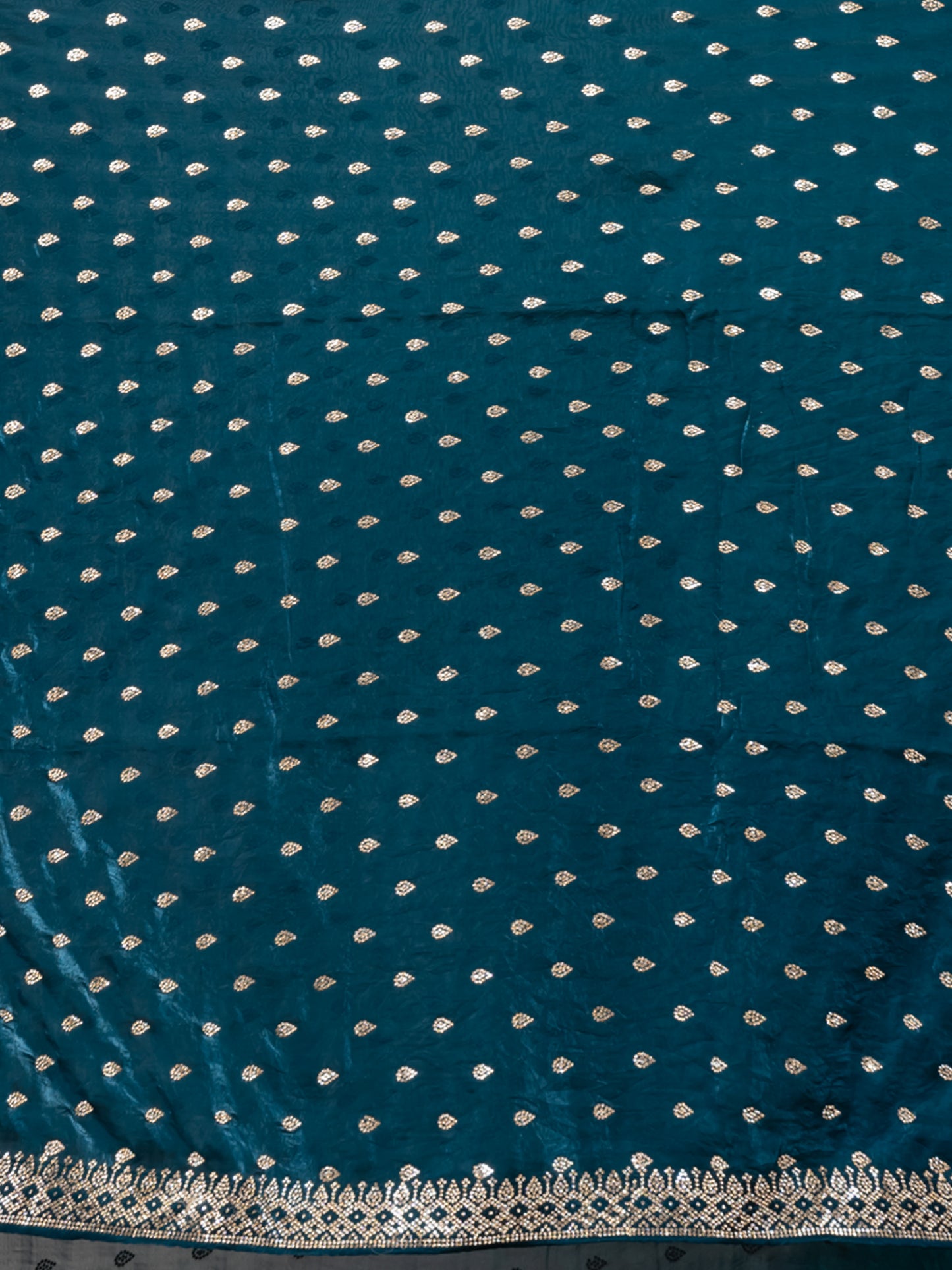 Sophisticated Teal Malmal Silk Saree with Embroidered Border