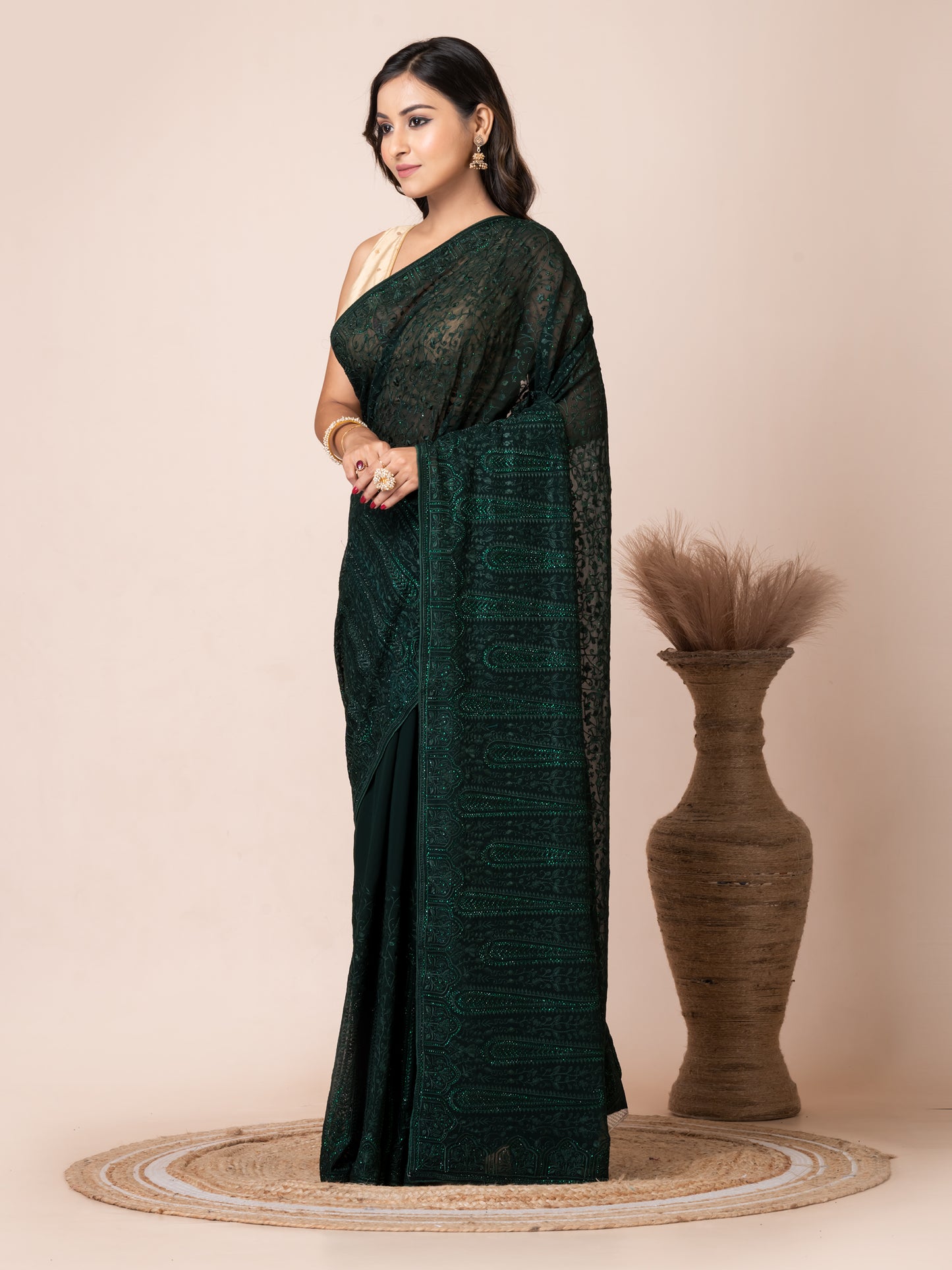 Luxurious Dark Green Fancy Chiffon Saree with Jal Work