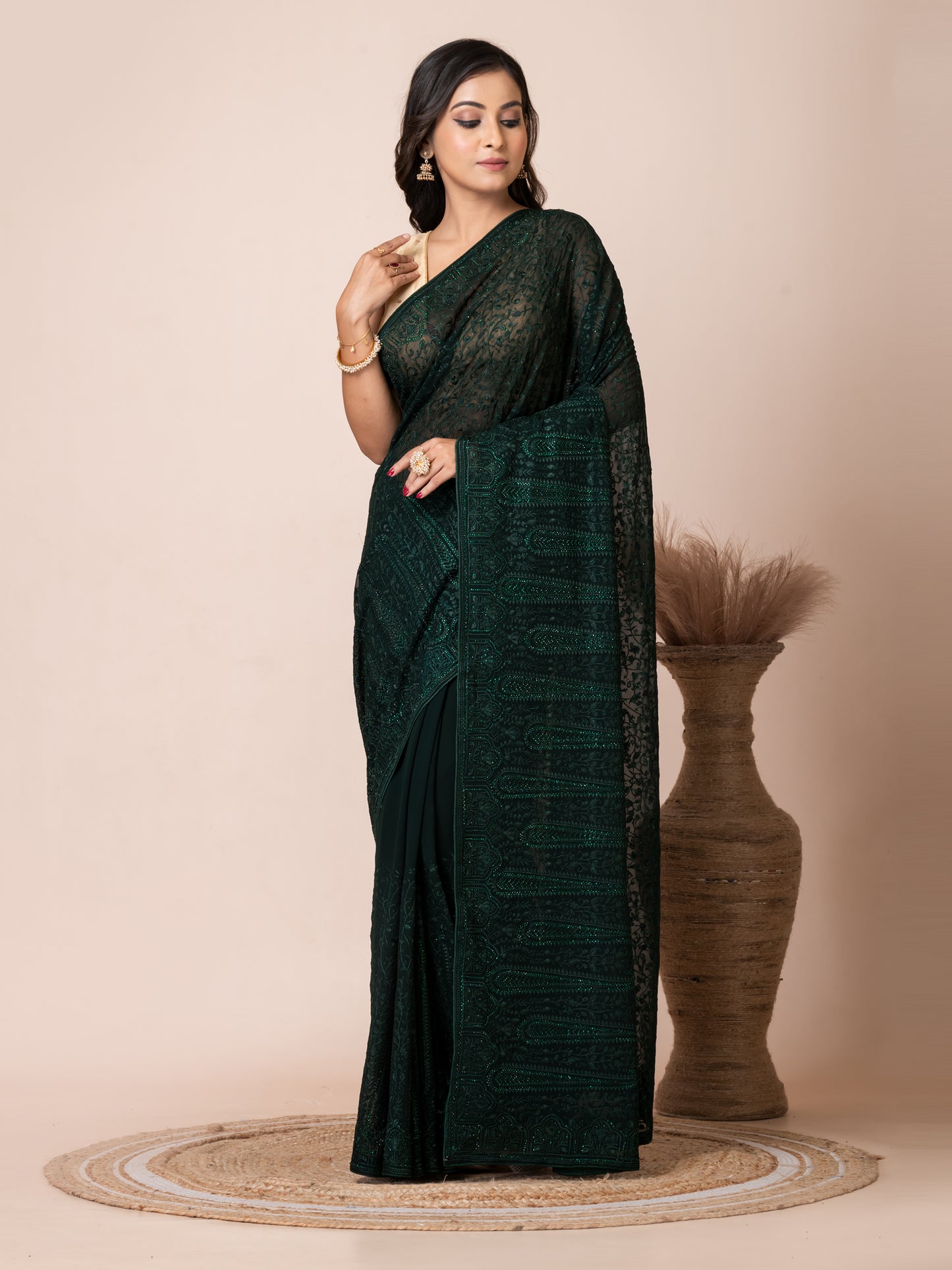 Luxurious Dark Green Fancy Chiffon Saree with Jal Work