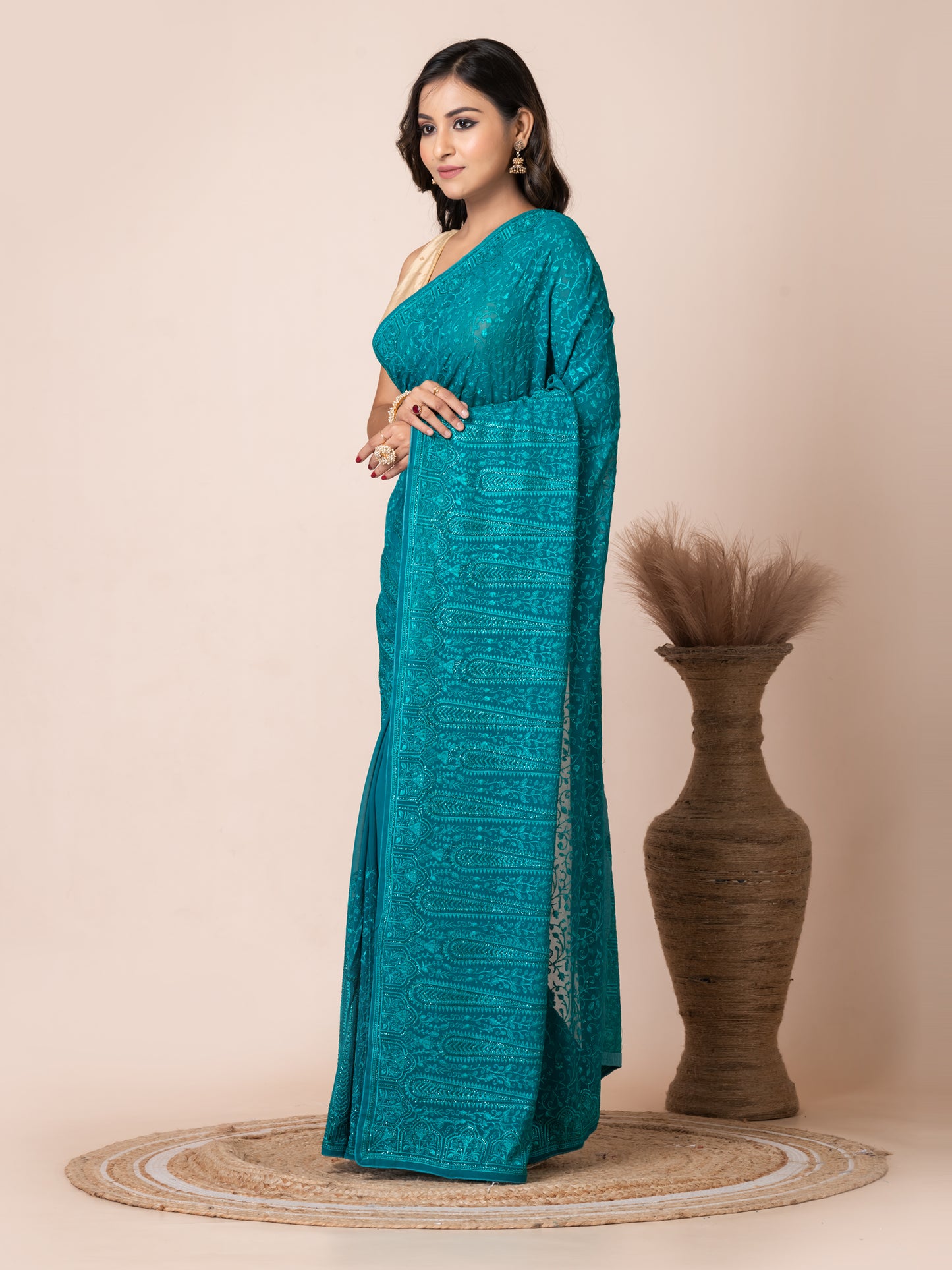 Stunning Turquoise Fancy Chiffon Saree with Jal Work