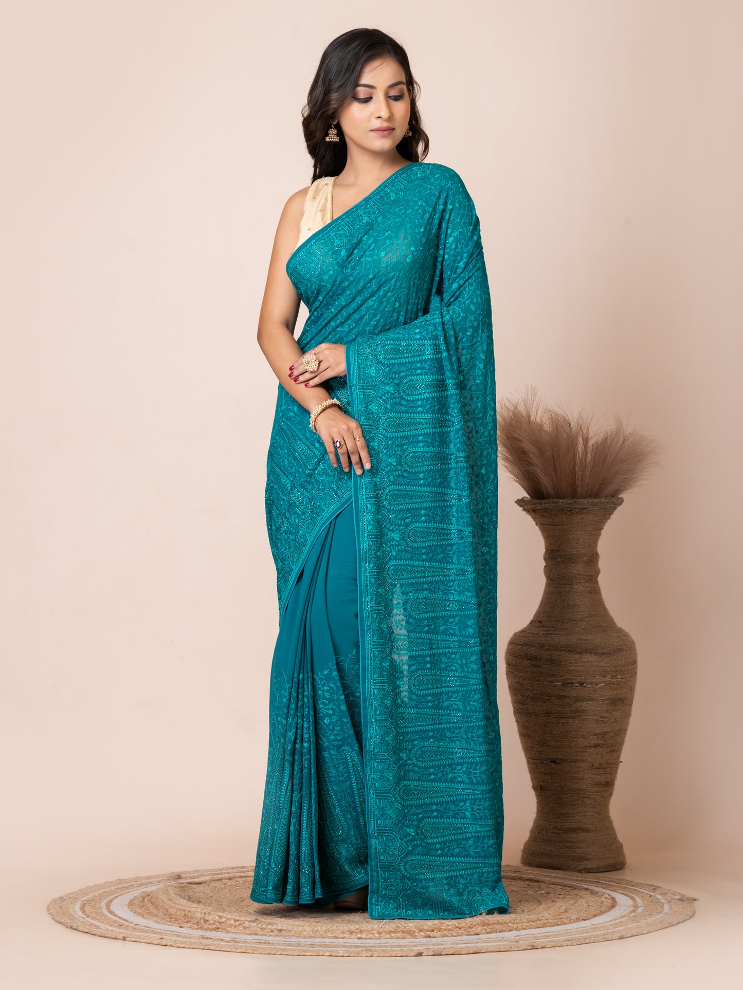 Stunning Turquoise Fancy Chiffon Saree with Jal Work