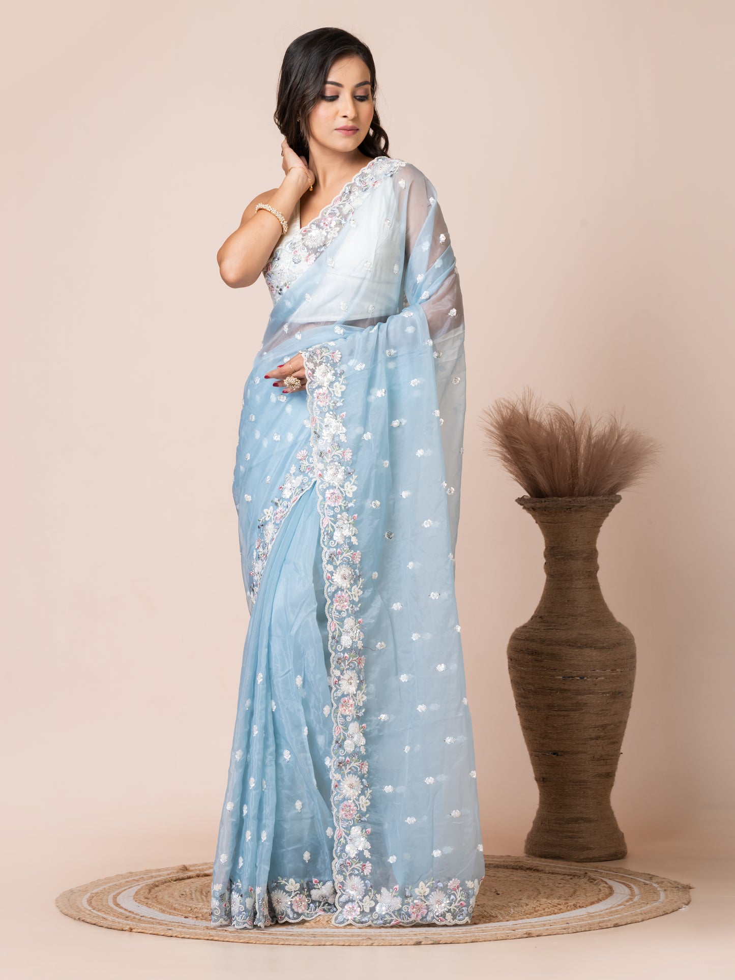 Graceful Sky Blue Organza Tissue Saree with Floral Embroidery