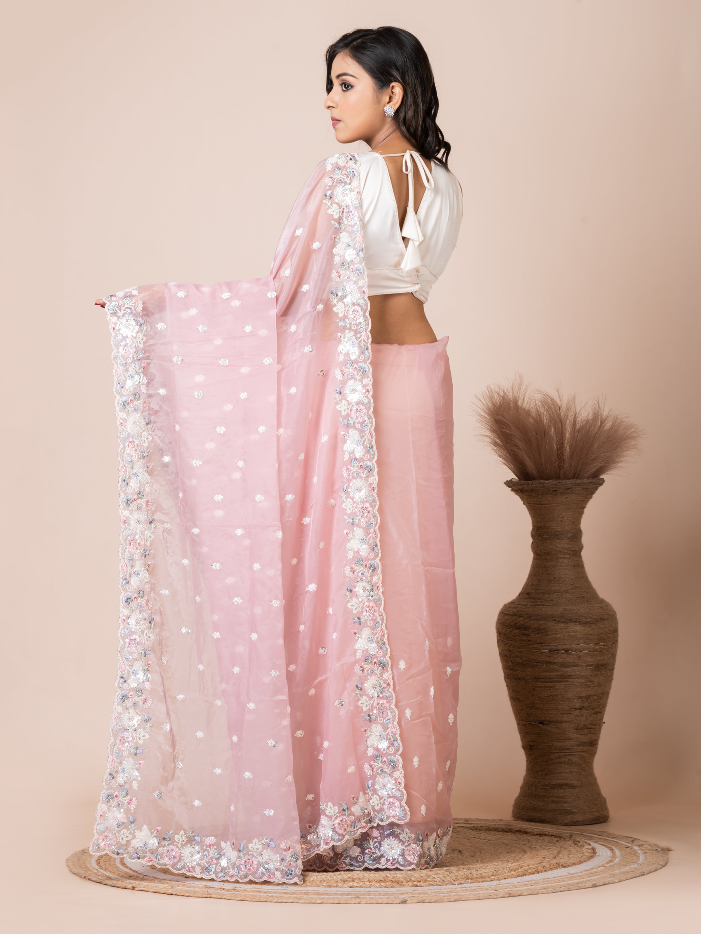 Charming Peach Organza Tissue Saree with Floral Embroidery