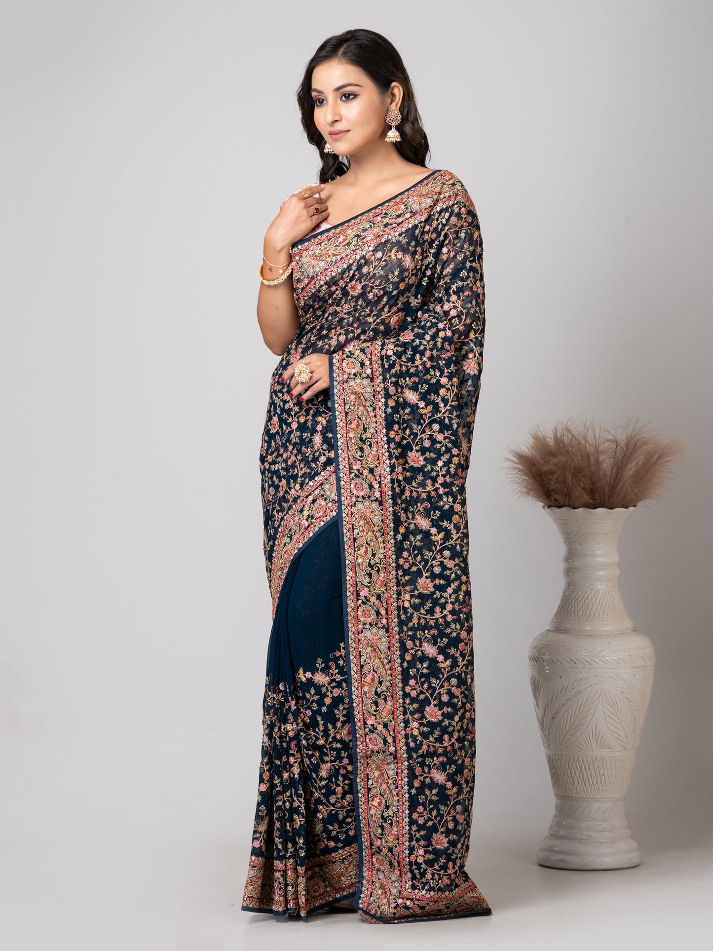 Luxurious Emerald Dark Green Fancy Chiffon Saree with Jal Work